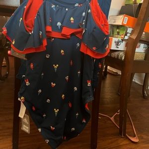 Mickey Mouse bathing suit with cover up. Both new with tags.